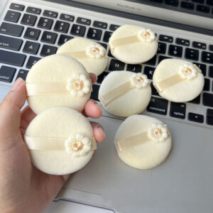 small yellow flower makeup puff